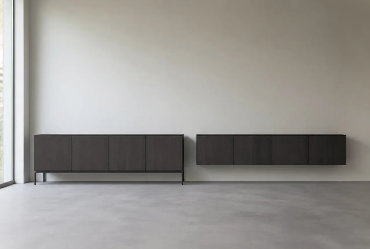 Two long casegoods side by side in a bare room, one standing on legs and one floating off the wall